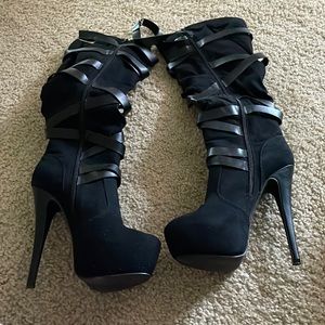 Knee High black heeled boots